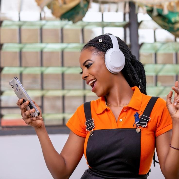 Kaveri Mehta, Lead Design Curator at High Land Vector, reviewing corporate floral arrangements